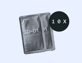 Two SD-01 multivitamin sachets with a 10x badge